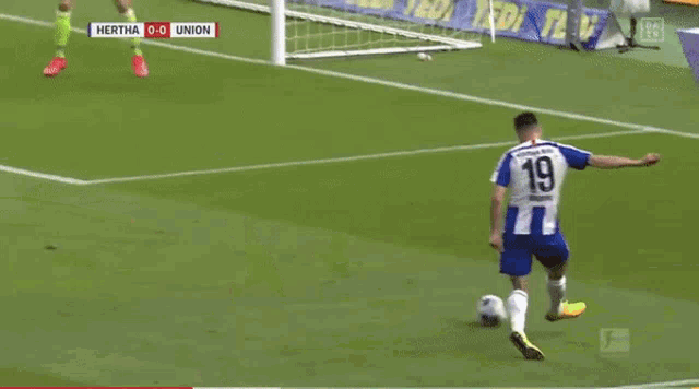 a soccer game between hertha and union is being played on a soccer field