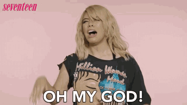 a woman wearing a shirt that says oh my god on it