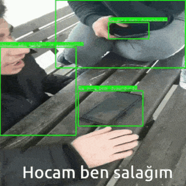 a man sitting on a bench holding a cell phone with the words hocam ben salagim on the bottom