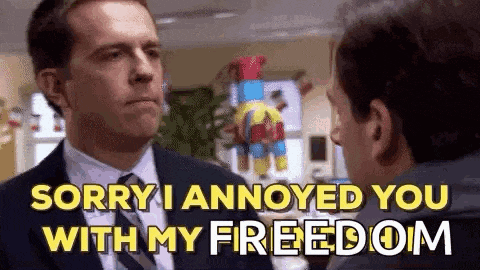 a man in a suit and tie is talking to another man and saying `` sorry i annoyed you with my freedom ''