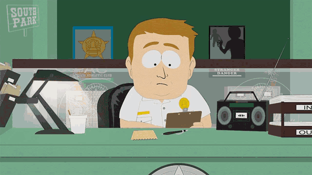 a cartoon of a man sitting at a desk with a sign that says south park