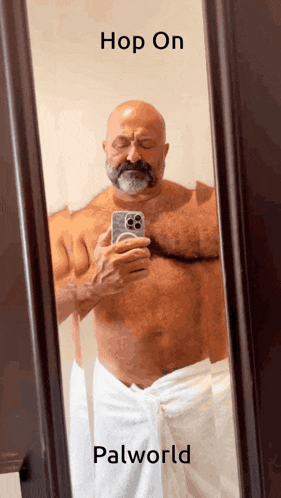 a man taking a selfie in front of a mirror with the words hop on palworld written below him