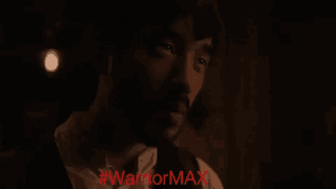 a close up of a man 's face with the words #warriormax written on the bottom