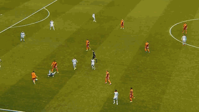 a soccer player with the number 7 on his jersey is running after the ball