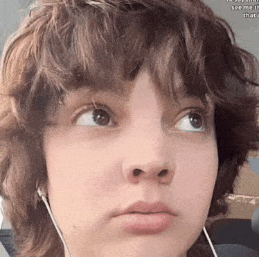a close up of a person 's face with the words " see me that " visible in the corner