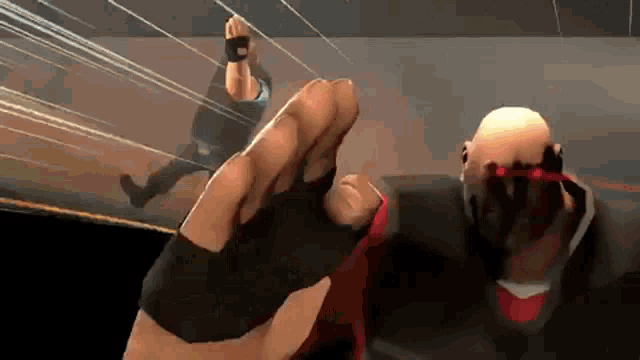 a man in a boxing glove is kicking another man in the face in a video game .