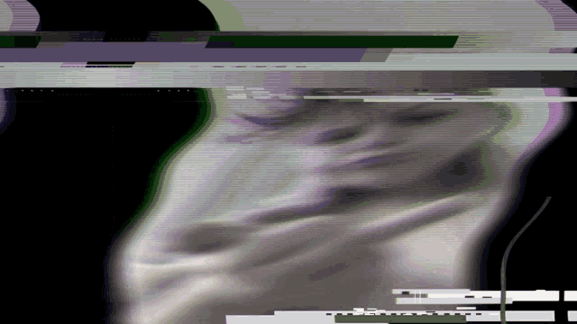 a blurred image of a person 's face with a green and purple border
