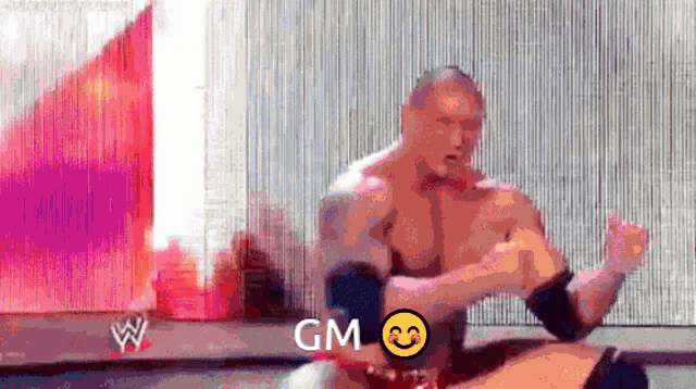 a man with a smiley face and the word gm on it