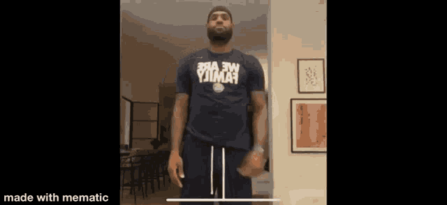 a man with a beard is wearing a shirt that says ' yjima ' on it