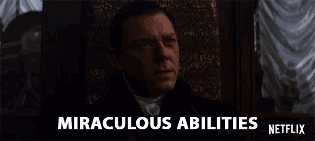 a poster for miraculous abilities shows a man in a black suit