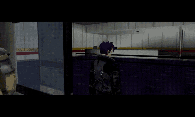 a man in a purple hat is walking through a dark room