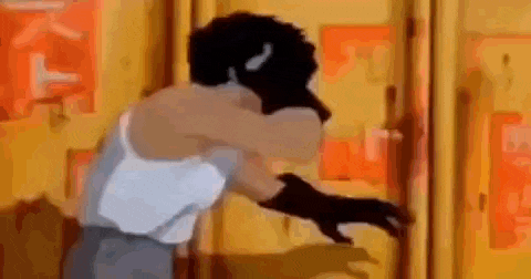 a man wearing a hat and gloves is opening a door .