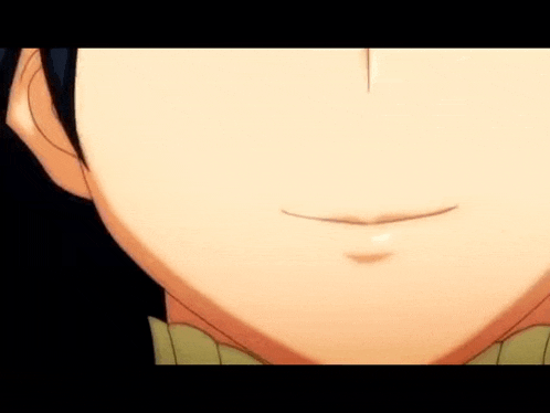 a close up of a person 's mouth with a smile