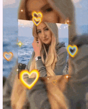 a picture of a woman with hearts surrounding her face