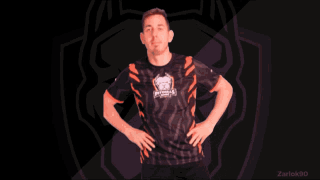 a man wearing a black and orange jersey with the number 1 on the back