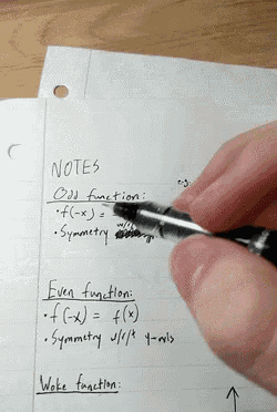 someone is writing notes on a piece of paper
