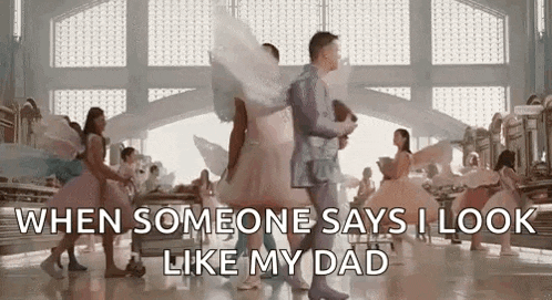 when someone says i look like my dad , a man and a woman are dancing in a room with angels .