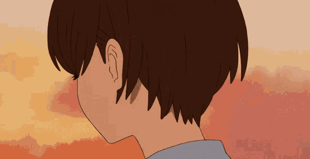 a close up of a person 's ear with a cloudy sky in the background