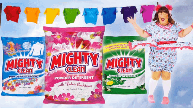 three bags of mighty clean powder detergent are on display