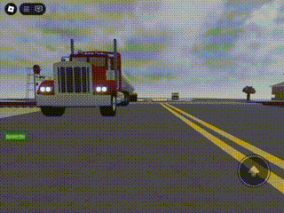 a kenworth semi truck is driving down a road