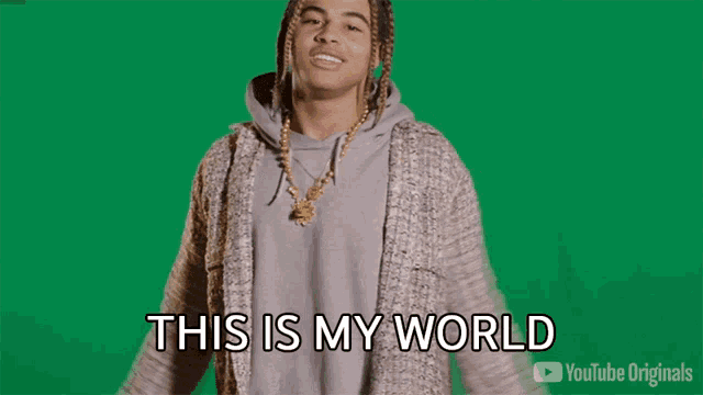 a man with dreadlocks is saying this is my world