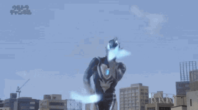 a man in a superhero costume is standing in front of a city with a blue shield around him .