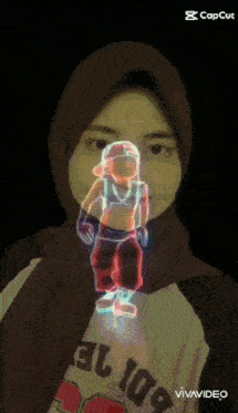 a woman wearing a hijab and a shirt that says ' el 100 '