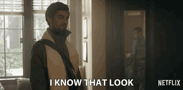 a man says i know that look in front of a window