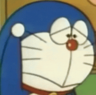 a close up of doraemon 's face with tears coming out of his eyes