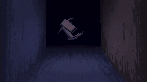 a pixelated image of a person 's face with the letter t visible