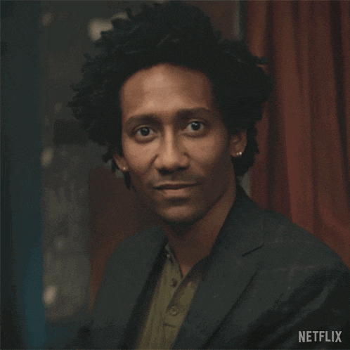a man in a suit says i erased it in a netflix advertisement