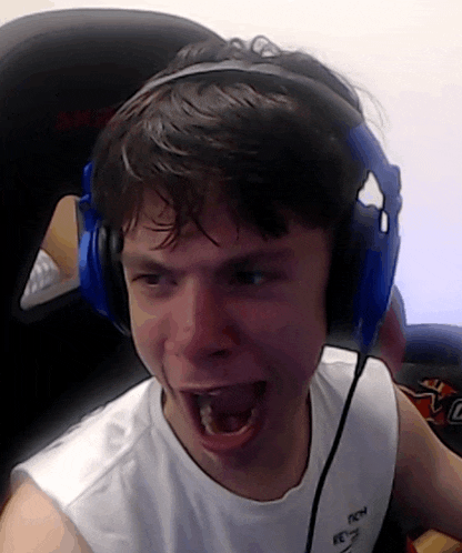 a young man wearing headphones and a white shirt with the word fetch on it