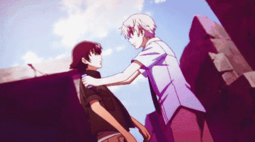 two anime characters are standing next to each other and one is holding the other 's shoulder