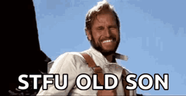 a man with a beard and suspenders is smiling and saying `` stfu old son '' .