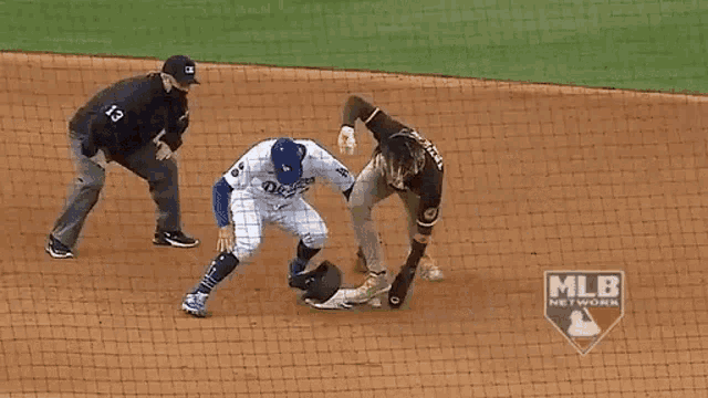 a mlb network logo can be seen in the background of this baseball game