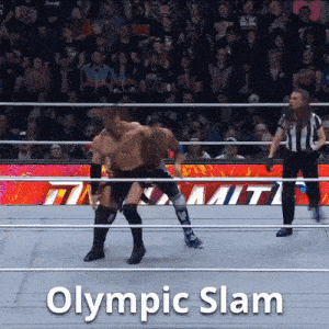 two wrestlers in a ring with the words olympic slam on the bottom right