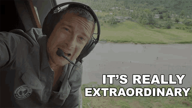 a man wearing headphones with the words it 's really extraordinary above him