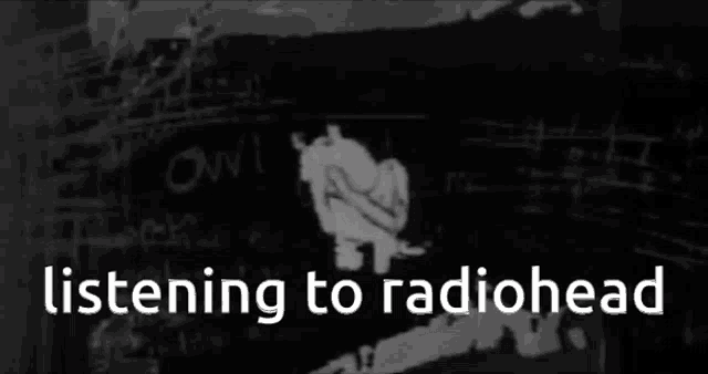 a black and white photo with the words listening to radiohead on the bottom