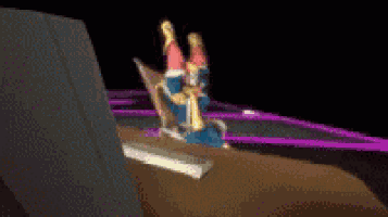 a cartoon character is standing on a table in front of a computer .