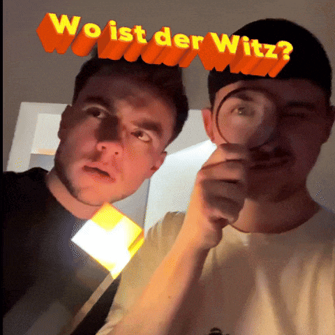two men are looking through a magnifying glass with the words wo ist der witz written above them