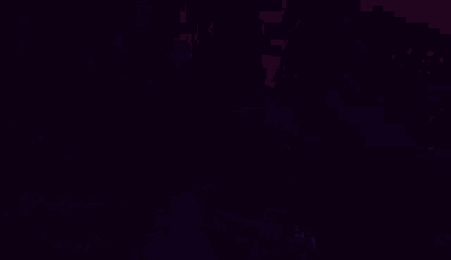 it looks like a cross in the middle of a galaxy with a lot of lights coming out of it .
