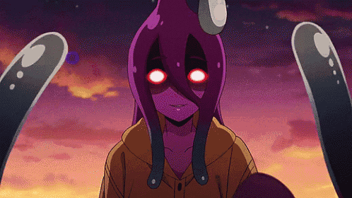 a purple monster with red eyes is standing in front of a sunset sky .