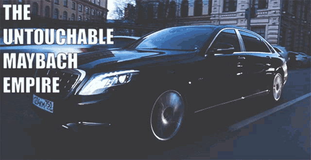 a black maybach empire car is parked in a parking lot