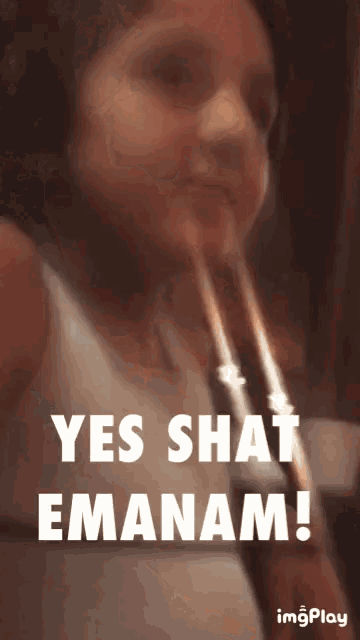 a girl drinking through a straw with the words yes shat emanam