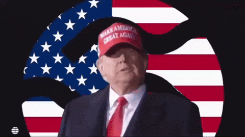 donald trump is wearing a red make america great again hat