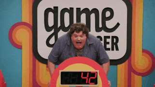 a man is playing a game called game over