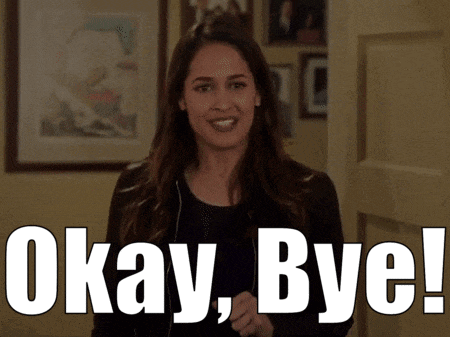 a woman says okay bye in front of a picture