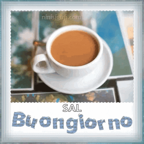 a cup of coffee sits on a saucer with the words buongiorno written on it