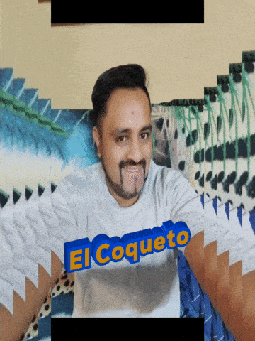 a man wearing a shirt that says el coquete on it