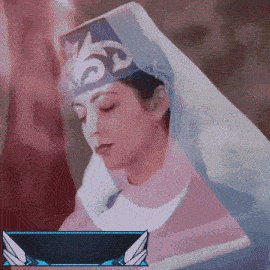 a pixelated image of a woman wearing a hat and veil